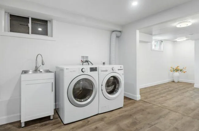 a laundry room with a washer and dryer
