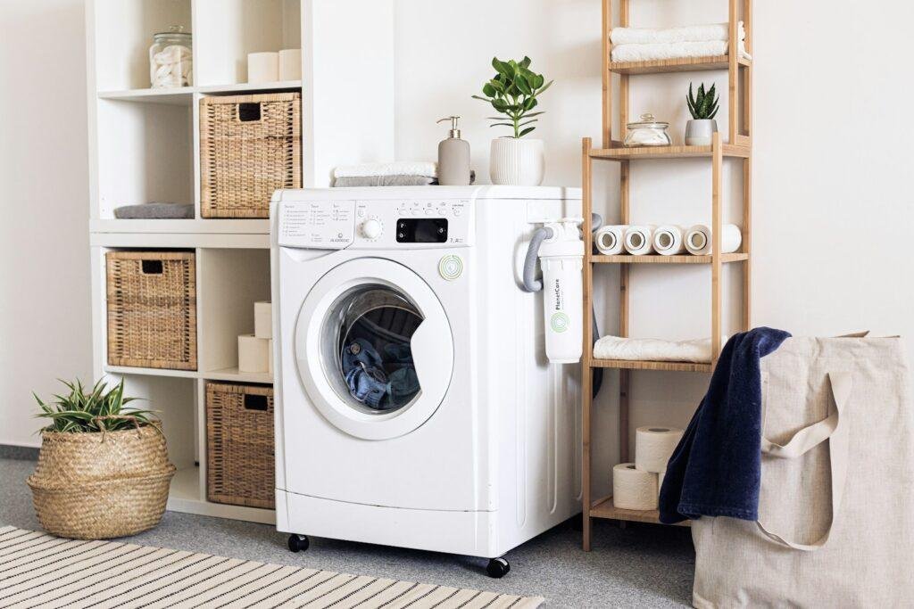 white front load washing machine requiring repairs